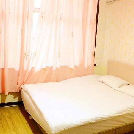 Qingdao Peninsula Four Seasons Business Hotel ภายนอก รูปภาพ
