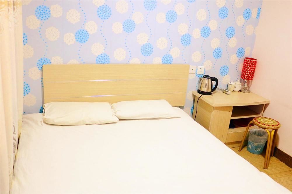 Qingdao Peninsula Four Seasons Business Hotel ภายนอก รูปภาพ