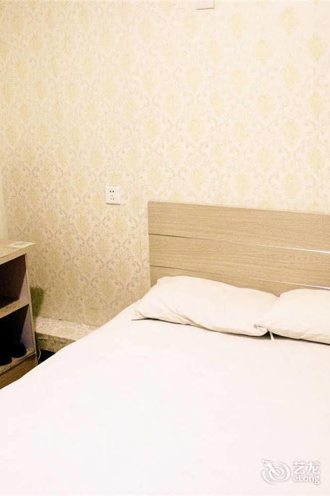 Qingdao Peninsula Four Seasons Business Hotel ภายนอก รูปภาพ